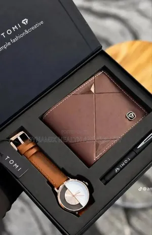 Tomi Wristwatche
Comes With a Watch, Wallet and Customized Pen as Seen