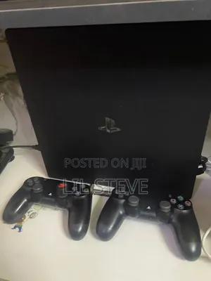 PS4 Pro With 2 Pads Low Version With Games Like Fc 26 Watch Dog Etc