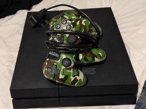 Ps4 With 2 Pads and Fc26 and Gta 5 Cassette