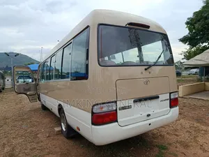 Toyota Coaster 2010 Gold