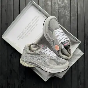 New Balance Grey and White Sneakers