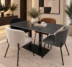 Modern Dining Set Featuring a Dark, Grid-Patterned Ceramic or Stone-