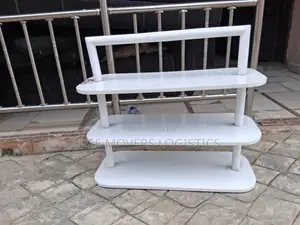 Neatly Used Three Step Shoe Rack.
