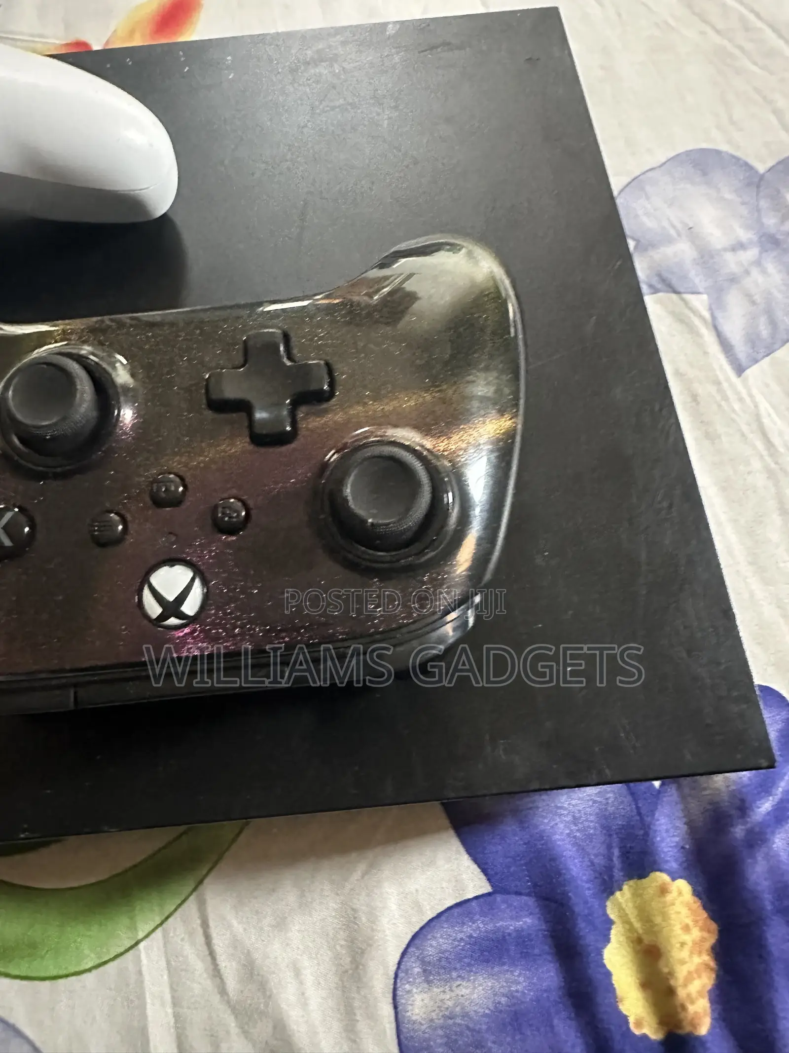 Xbox One X, Two Wired Controllers and Games Installed