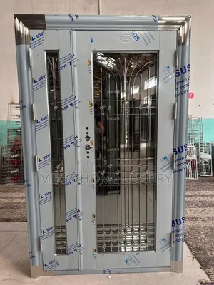Brushed Steel Grill Entryway Door
