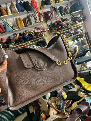 Textured Faux-Leather Crescent Shoulder Bag