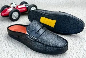 Clarks Embossed Leather Penny Loafer Mules in Black