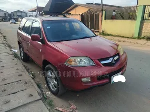 Acura MDX Touring 4dr SUV AWD (3.5L 6cyl 5A) 2006 Red