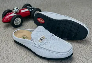 Louis Vuitton White Woven Leather Monogram Mule Loafers