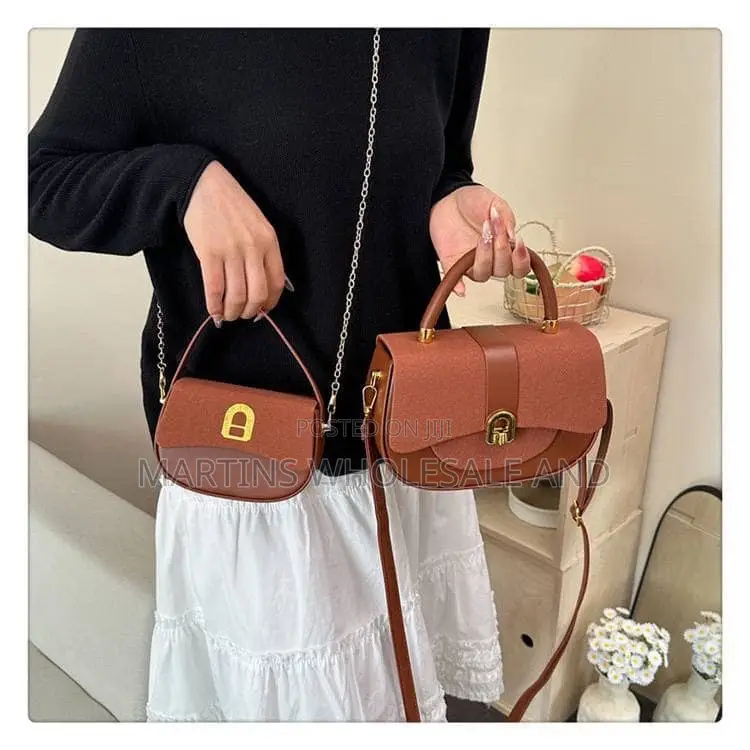 Women's Handbag Set Featuring a Structured Pleated Base and a Distinct