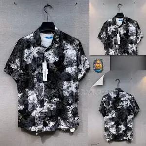 Short-Sleeve Button-Down Vintage Shirt Featuring a Striking Black An