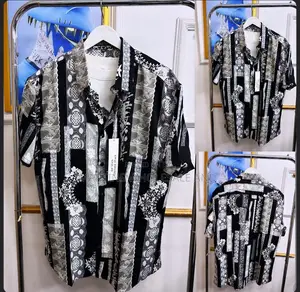 Short-Sleeve Button-Down Vintage Shirt Featuring a Striking Black An