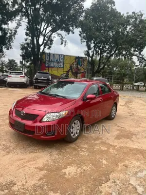 Toyota Corolla Base 4dr Sedan (1.8L 4cyl 5M) 2010 Red