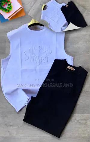 Brown Sleeveless Top Featuring an Embossed Valentino Logo on the Front