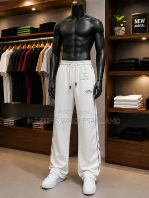 A Pair of Black and Light Grey Colorblock Jogger Pants Featuring