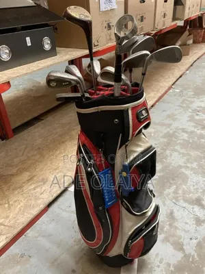 Collection of Golf Clubs and Bag