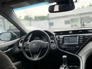 Toyota Camry LE FWD (2.5L 4cyl 8AM) 2018 Brown