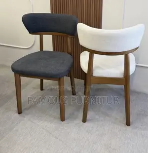 Modern Upholstered Dining Chairs Curved Backrests and Warm Wooden