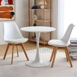 Modern White Round Dining Table Set Featuring Two White Plas