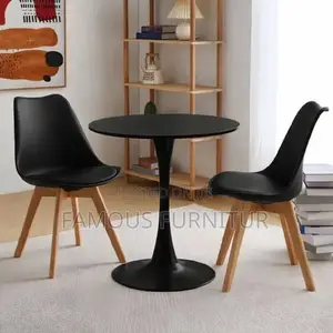 Modern White Round Dining Table Set Featuring Two White Plas