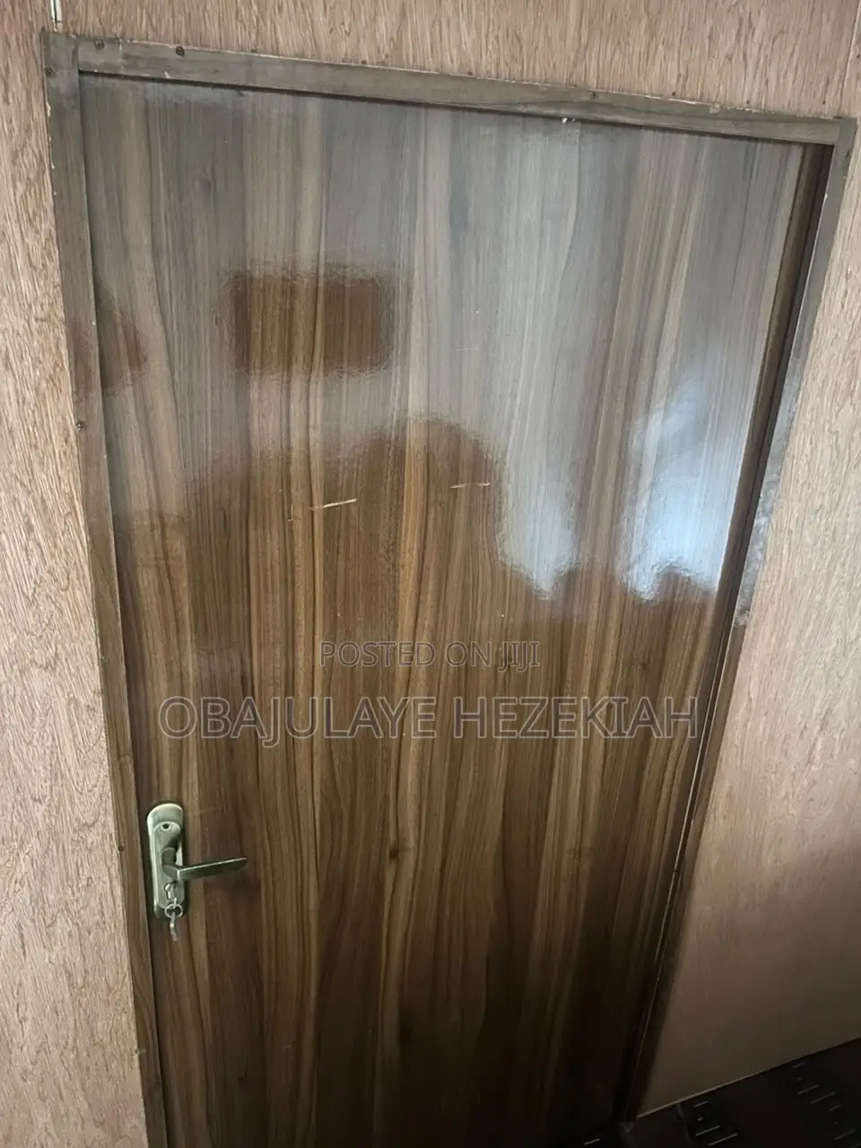 Neat Wooden Door With Lock Handle