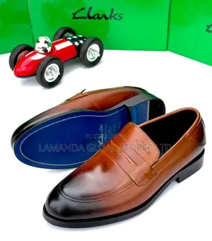 Clarks Leather Penny Loafers in Tan