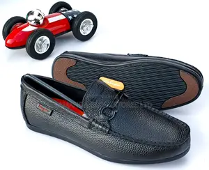 Salvatore Ferragamo Pebbled Leather Horsebit Loafers