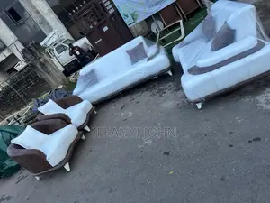 Unique Upholstered Chair in Brown and White