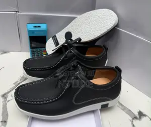 Clark’s White Sole Loafers