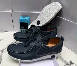 Clark’s White Sole Loafers