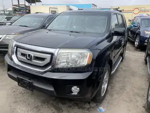 Honda Pilot Touring w/RES/Navi 4WD (3.5L 6cyl 5A) 2011 Black