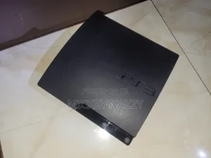 Playstation 3 Slim, With Pad and 5 Games.