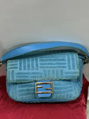 Stylish Sky Blue Textured Baguette Bag With Silver Buckle