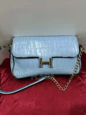 Trendy Sky Blue Croc-Effect Crossbody Bag With Gold Hardware