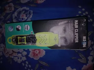 Rechargeable Hair Clipper + Accessories + Charging Cable