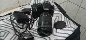 Lumix GH4 With Canon Lense, Xtra Battery Rugged Weather Sealed Camera