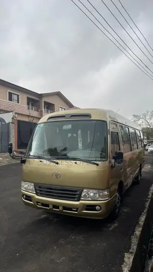 Toyota Coaster 2009 Gold
