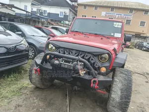 Jeep Wrangler Unlimited Sahara 4dr SUV 4WD (3.6L 6cyl 6M) 2014 Red