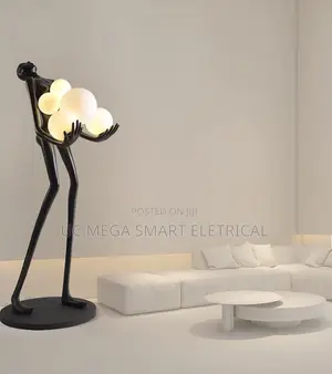 Humanoid Art Sculpture Holding Ball LED Floor Lamp Postmodern