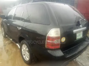 Acura MDX Touring 4dr SUV AWD (3.5L 6cyl 5A) 2006 Black