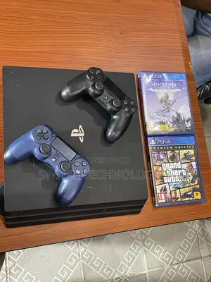 PlayStation 4Pro , 2 Pad , 2 Game Disk