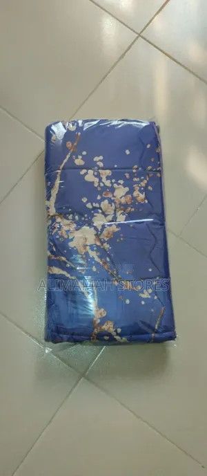 Two Padded Pillowcases With Bedsheet