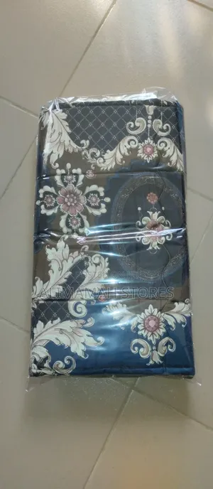 Two Padded Pillowcases With Bedsheet