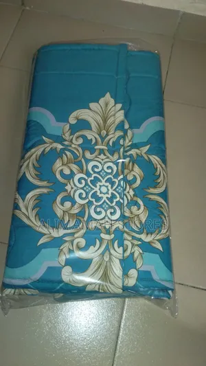 Two Padded Pillowcases With Bedsheet