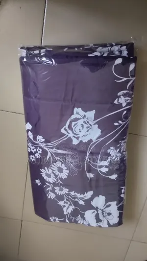 Two Padded Pillowcases With Bedsheet