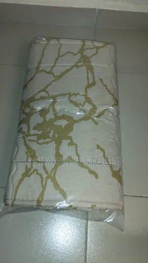 Two Padded Pillowcases With Bedsheet