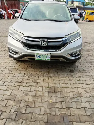 Honda CR-V EX-L w/Navigation 4dr SUV AWD (2.4L 4cyl CVT) 2015 Silver