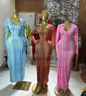 Ladies Quality Gowns,Tops,and Two Pieces Wholesale Retail