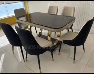 Dinning Table by 6 Seaters