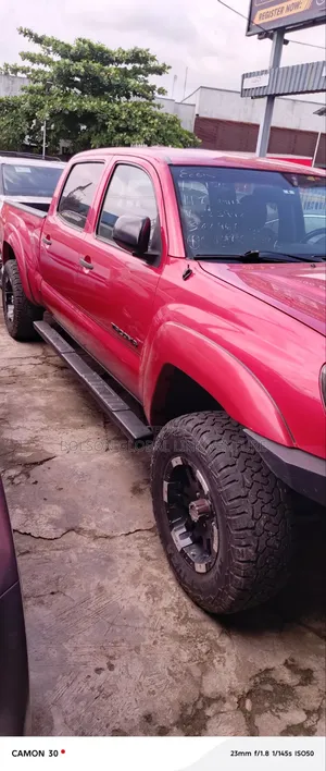 Toyota Tacoma PreRunner V6 4dr Access Cab 6.1 ft. SB (4.0L 6cyl 5A) Red